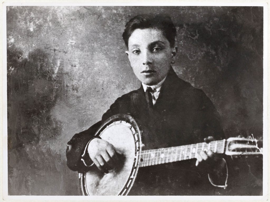 The young Django on a six string banjo The young Django on a six string banjo